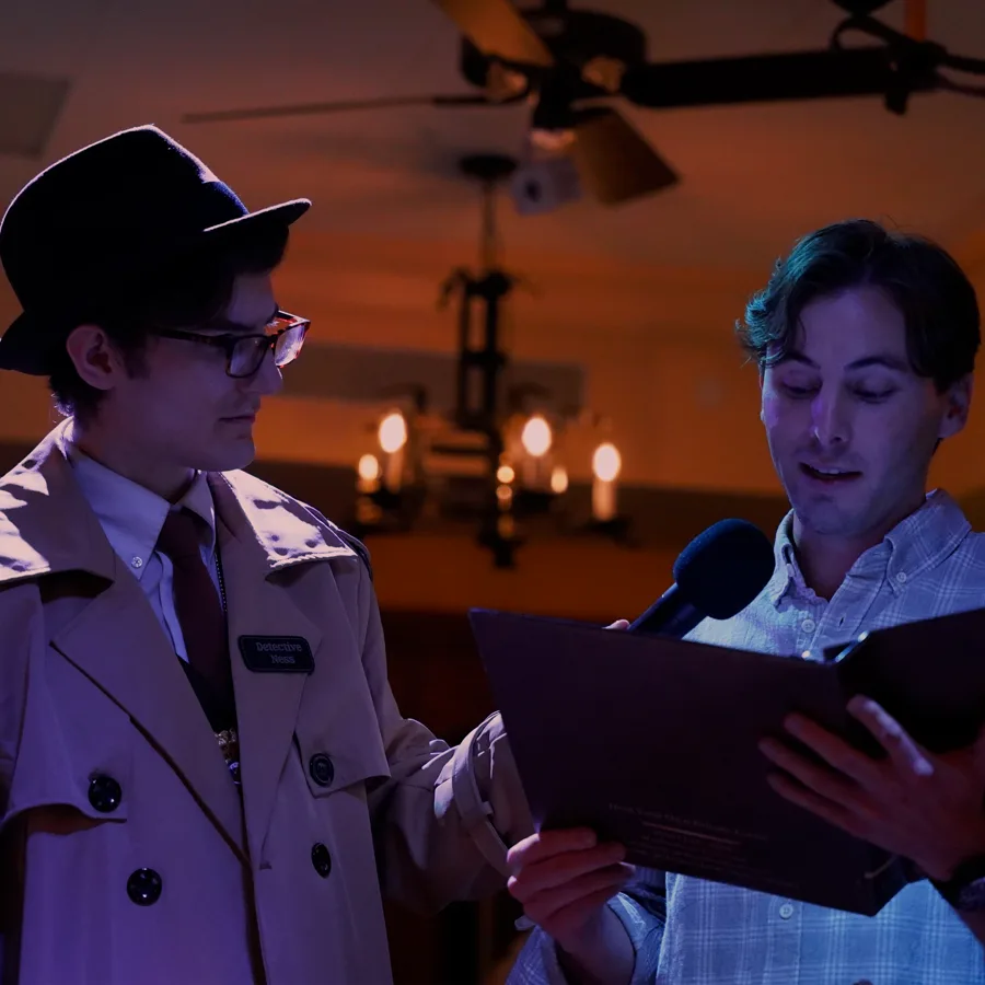 Professional actors performing at a Memphis murder mystery